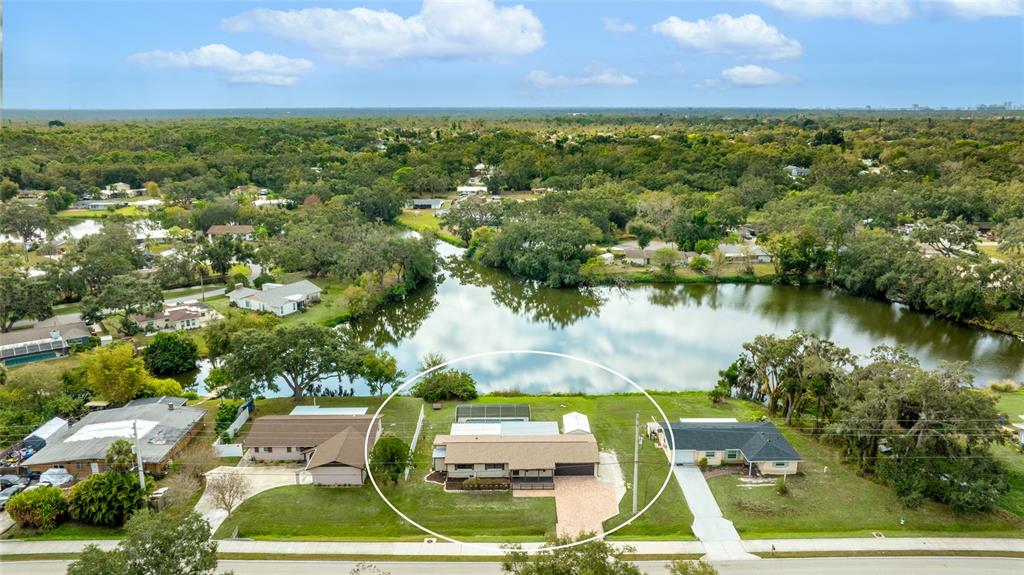 3452 Desoto Road Sarasota, FL 34235 - Photo 42 of 42 a view of yard with swimming pool and outdoor seating