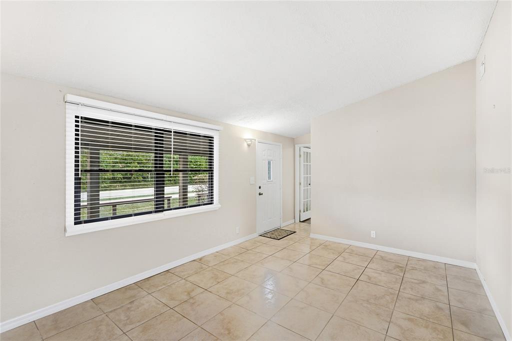 3452 Desoto Road Sarasota, FL 34235 - Photo 6 of 42 a view of an empty room with a window