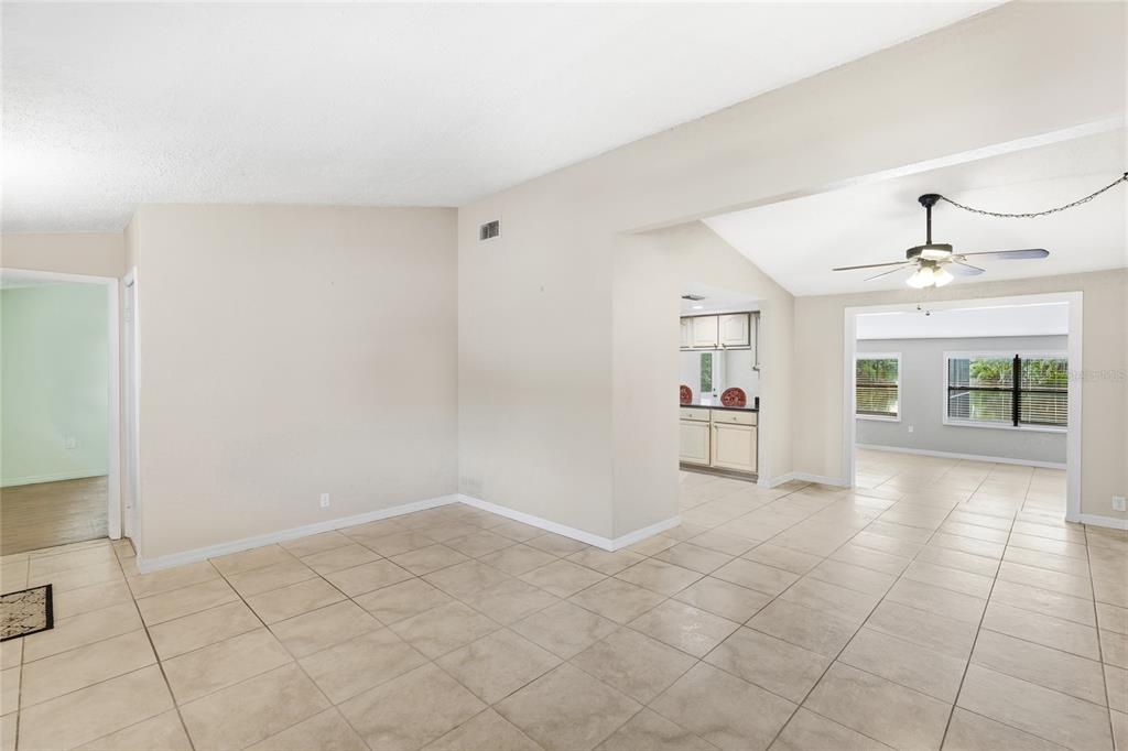 3452 Desoto Road Sarasota, FL 34235 - Photo 7 of 42 a view of an empty room with a window