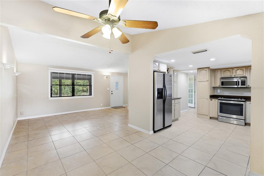 3452 Desoto Road Sarasota, FL 34235 - Photo 9 of 42 a view of open kitchen with a sink and a stove top oven