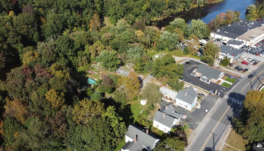 70 Powder Mill Road Maynard, MA 01754 - Photo 2 of 5 an aerial view of a city with lots of residential buildings