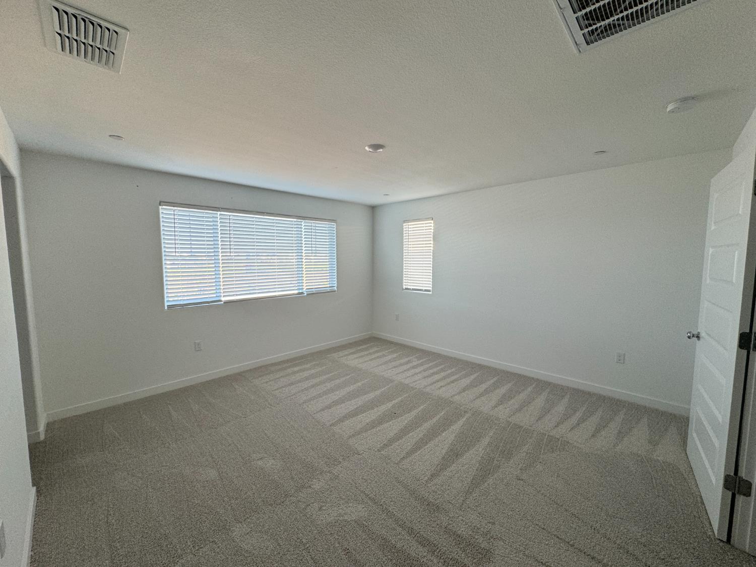 8524 Anker Way Elk Grove, CA 95757 - Photo 15 of 37 a view of an empty room with a window