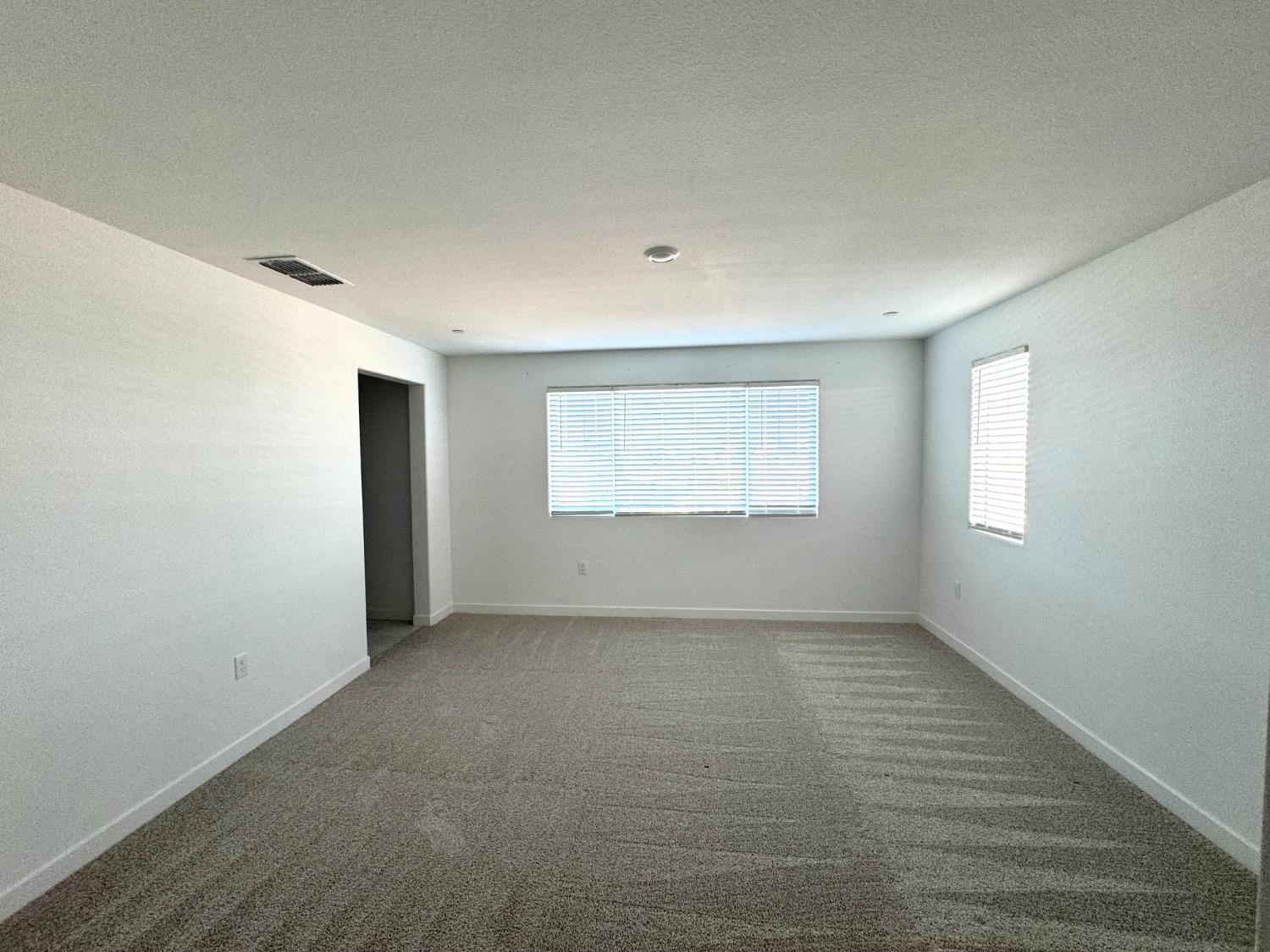 8524 Anker Way Elk Grove, CA 95757 - Photo 19 of 37 a view of an empty room with a window