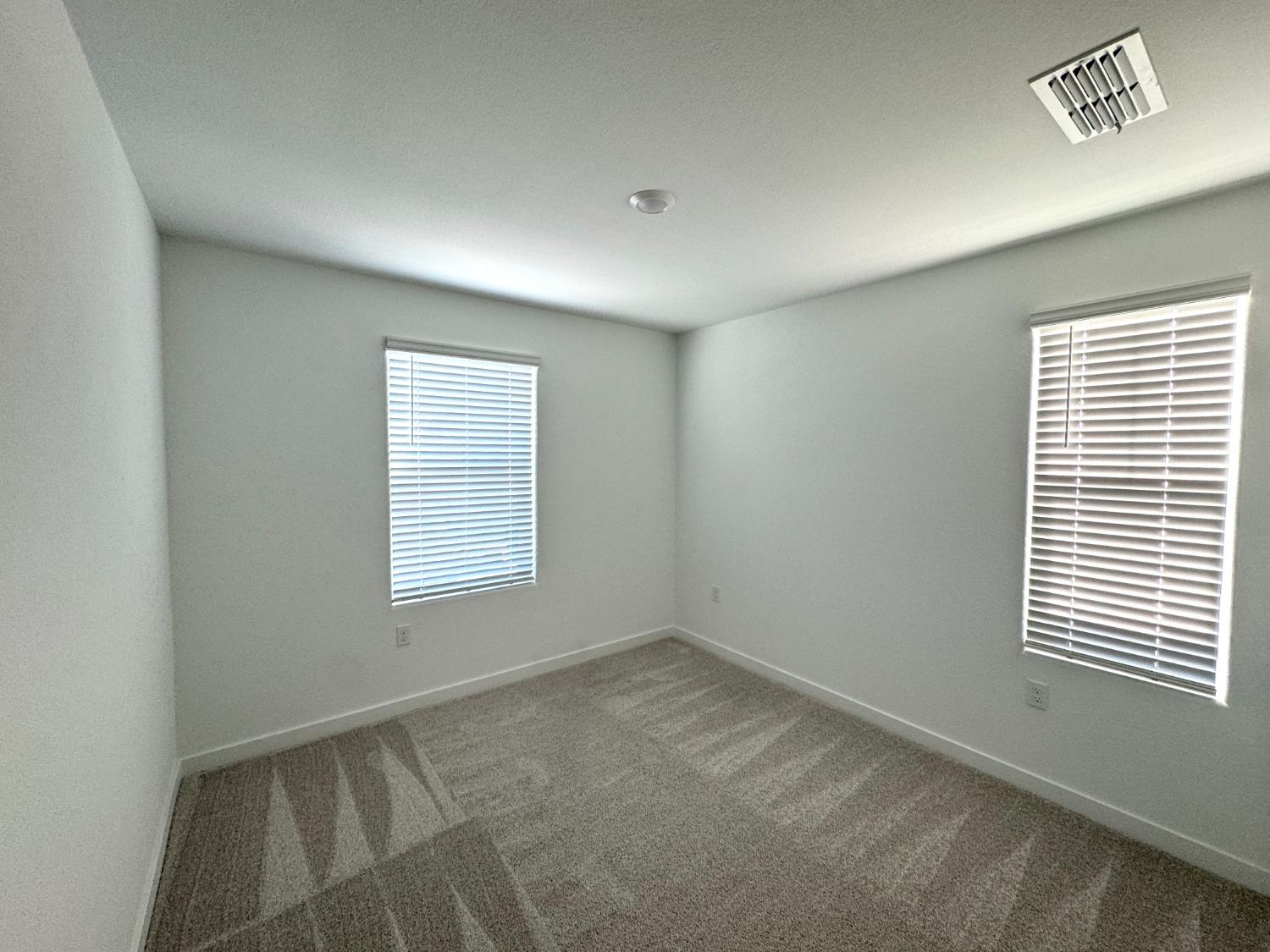 8524 Anker Way Elk Grove, CA 95757 - Photo 22 of 37 a view of an empty room with a window