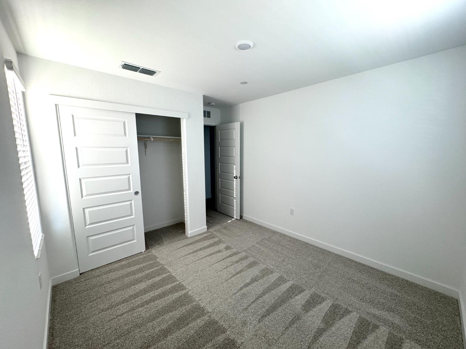 8524 Anker Way Elk Grove, CA 95757 - Photo 23 of 37 a view of walk in closet with stairs