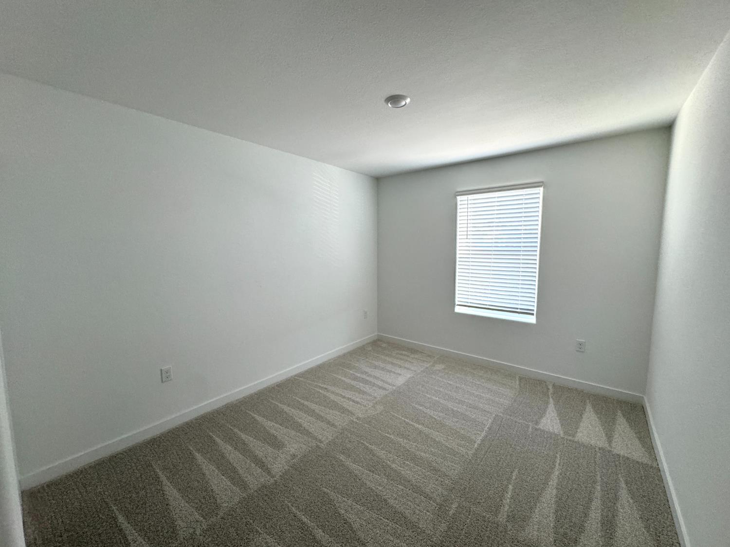 8524 Anker Way Elk Grove, CA 95757 - Photo 25 of 37 an empty room with a window