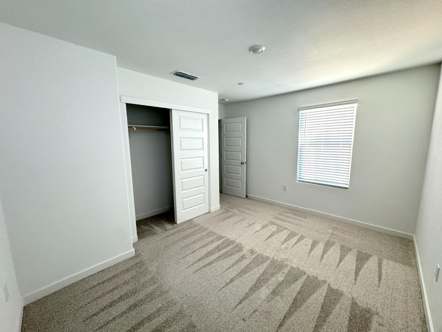 8524 Anker Way Elk Grove, CA 95757 - Photo 26 of 37 an empty room with closet