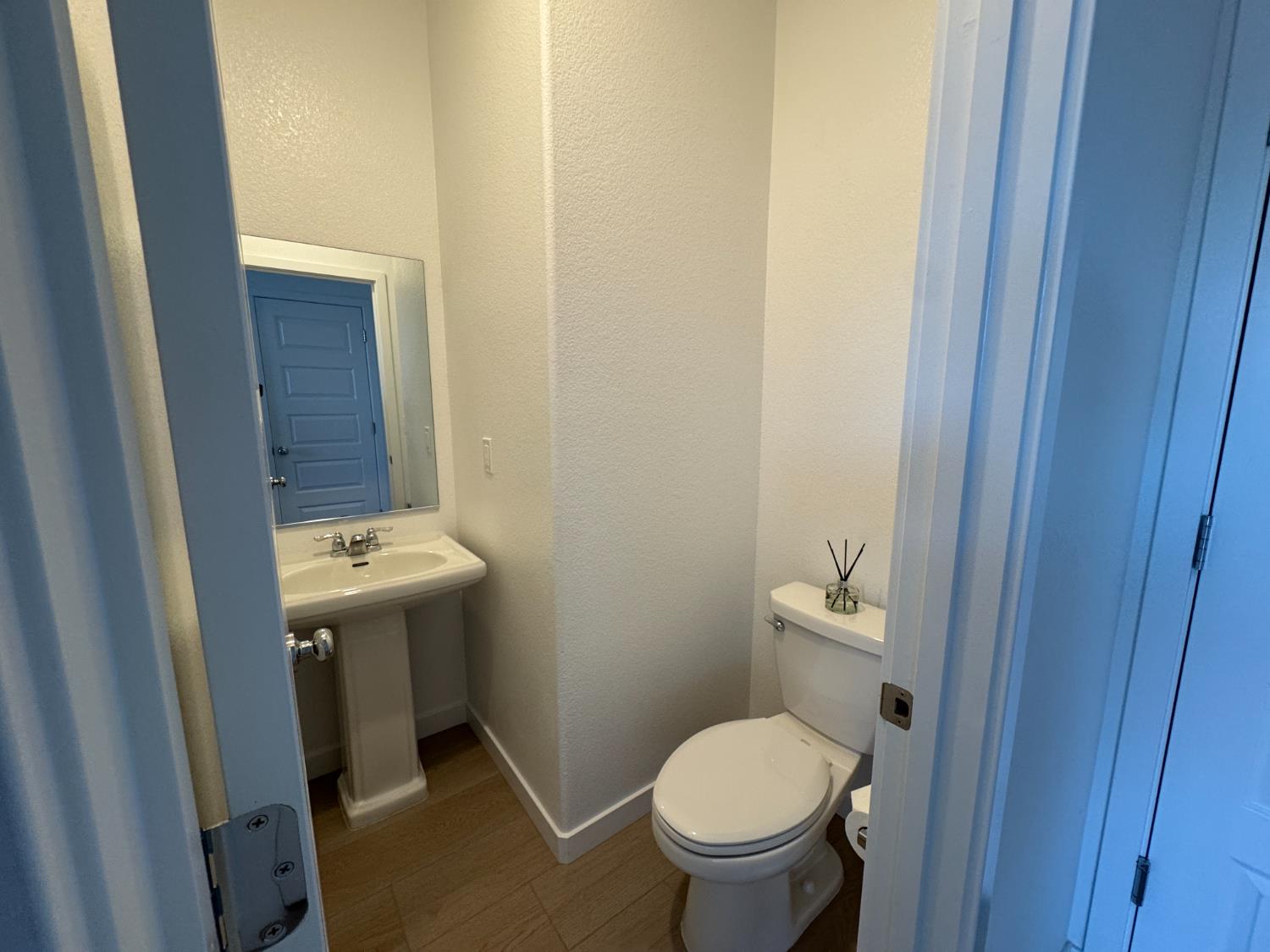 8524 Anker Way Elk Grove, CA 95757 - Photo 30 of 37 a bathroom with a sink toilet and shower
