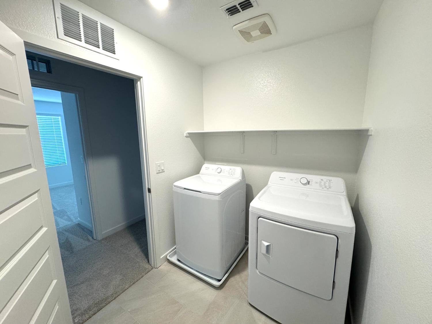 8524 Anker Way Elk Grove, CA 95757 - Photo 33 of 37 a utility room with dryer and washer