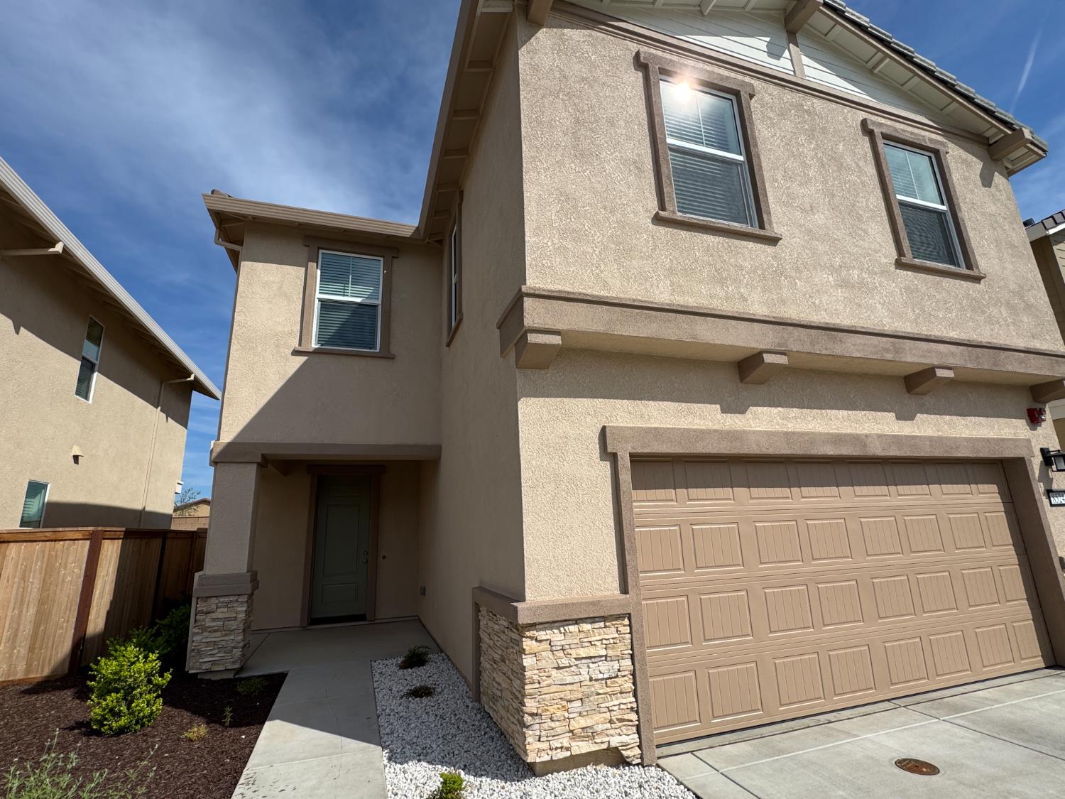 8524 Anker Way Elk Grove, CA 95757 - Photo 4 of 37 a front view of a house