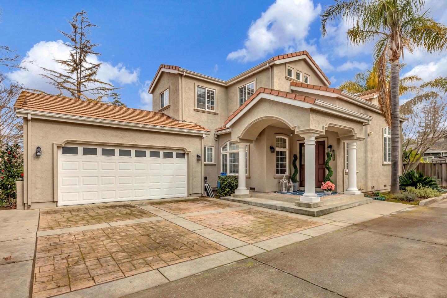 a view of a building with a windows and a ceiling fan