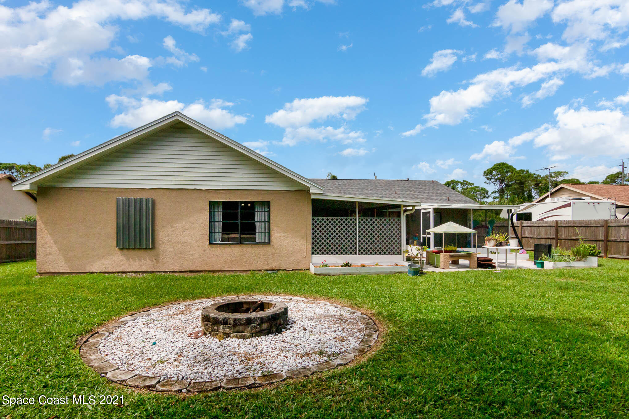 5617 Flint Road Cocoa, FL 32927 - Photo 24 of 25 a front view of a house with a yard