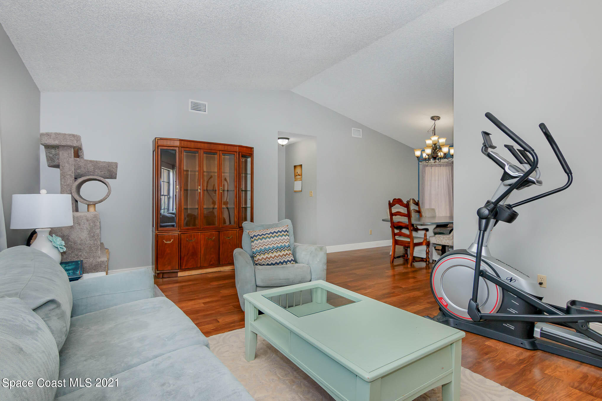 5617 Flint Road Cocoa, FL 32927 - Photo 8 of 25 a room with furniture a rug and white walls