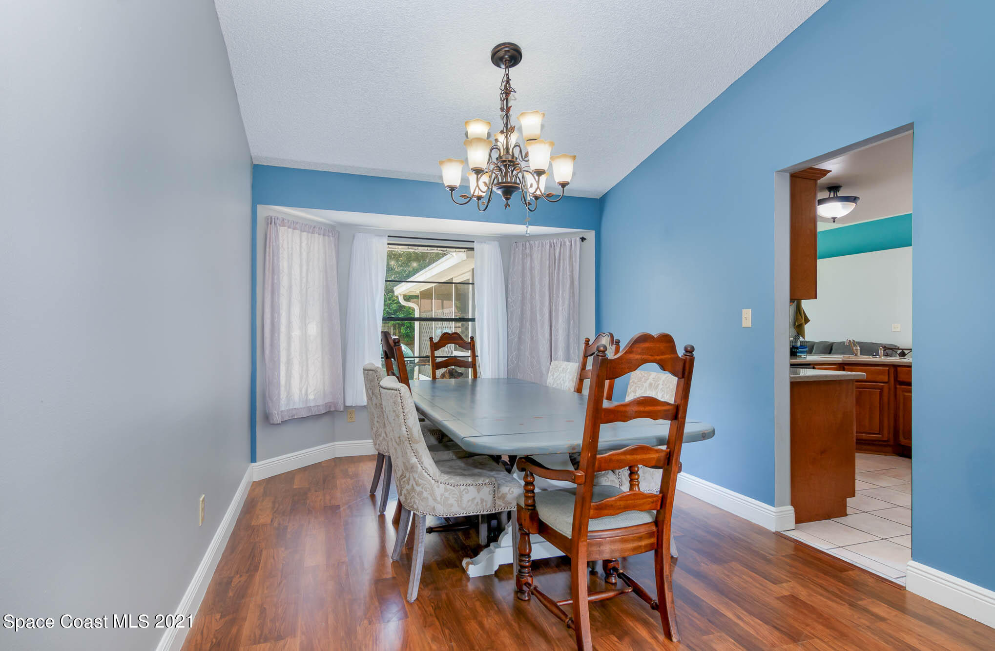 5617 Flint Road Cocoa, FL 32927 - Photo 9 of 25 a dining room with furniture and window