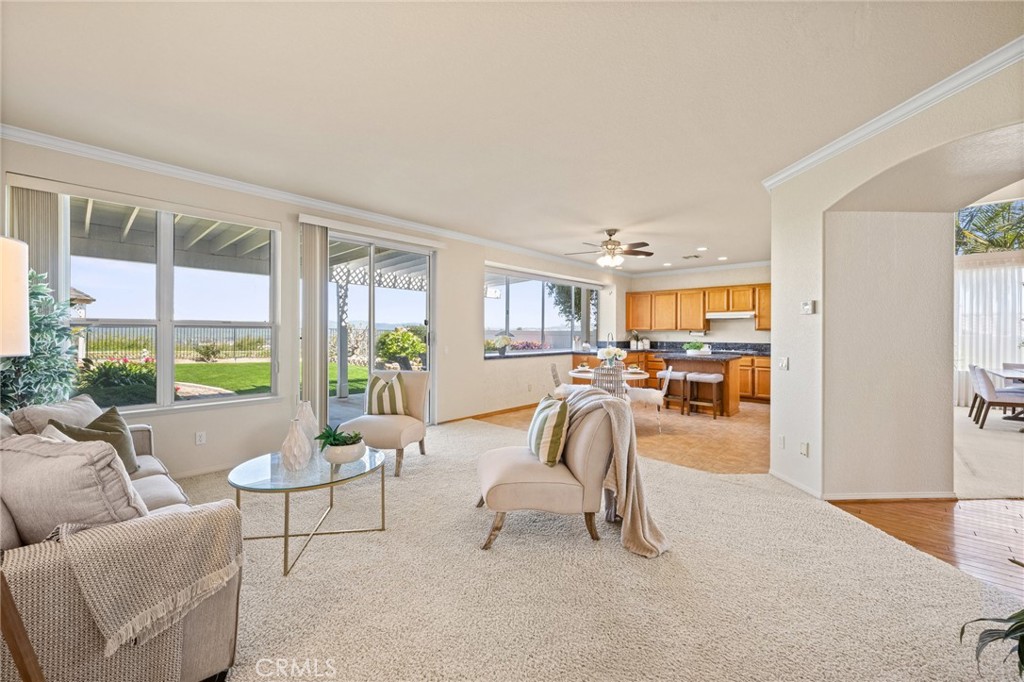 5118 Avenida De La Plata Oceanside, CA 92057 - Photo 15 of 42 a living room with furniture and a large window