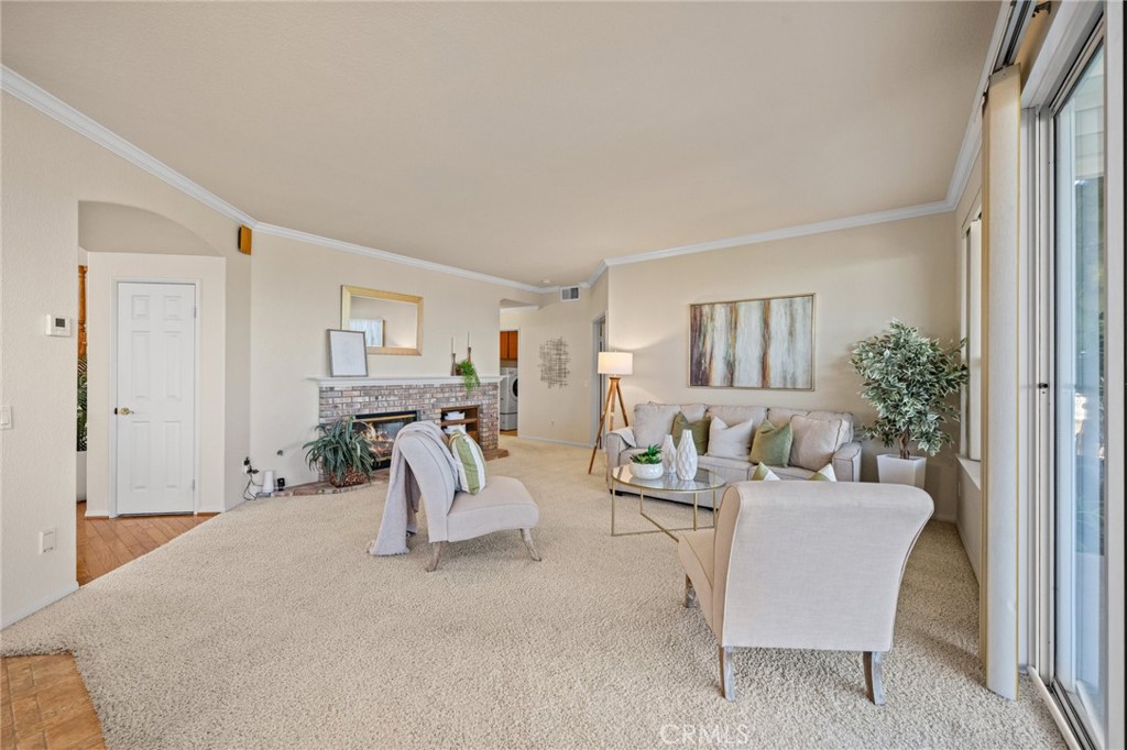 5118 Avenida De La Plata Oceanside, CA 92057 - Photo 17 of 42 a living room with furniture and a potted plant