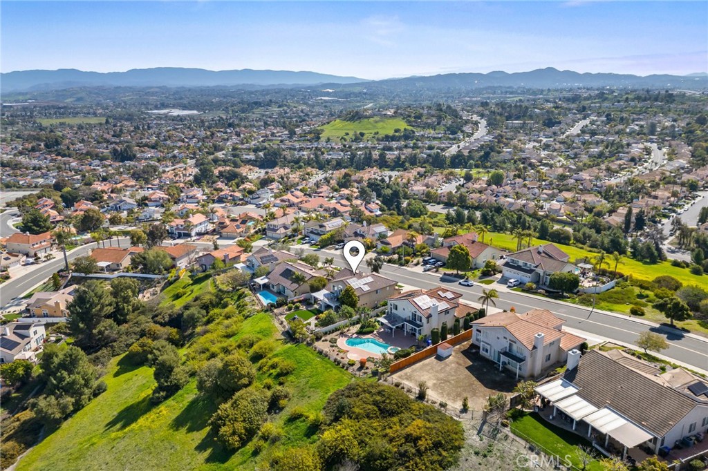 5118 Avenida De La Plata Oceanside, CA 92057 - Photo 40 of 42 an aerial view of a city with lots of residential buildings