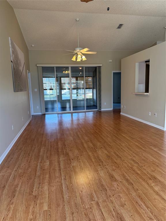 4501 River Ridge Drive Leesburg, FL 34748 - Photo 5 of 16 a view of a room window wooden floor and front door