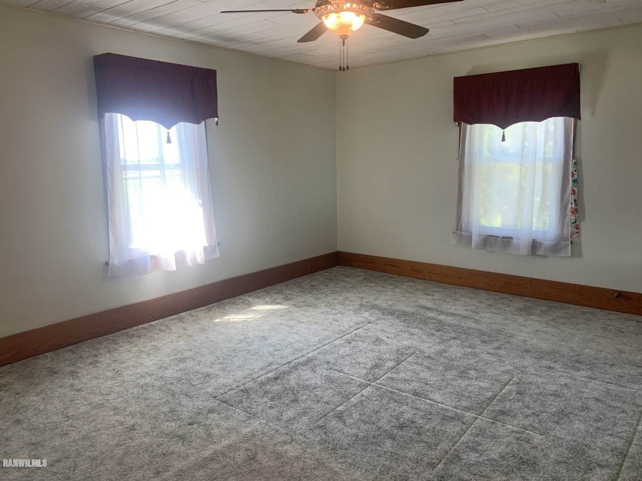 21287 Argo Fay Route Chadwick, IL 61014 - Photo 8 of 9 an empty room with a window
