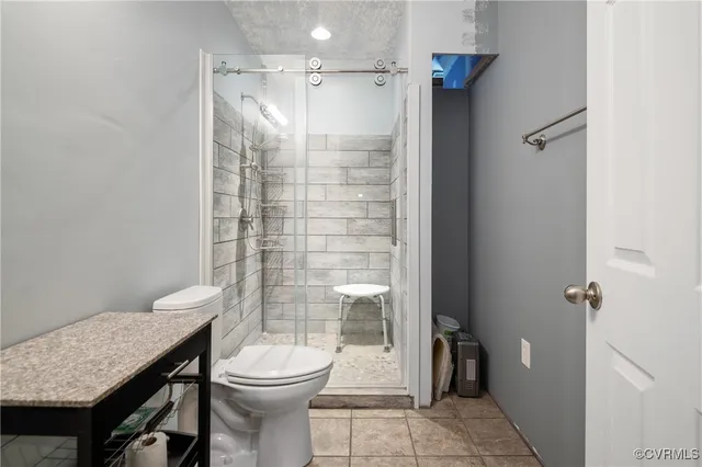 a room with furniture and a chandelier