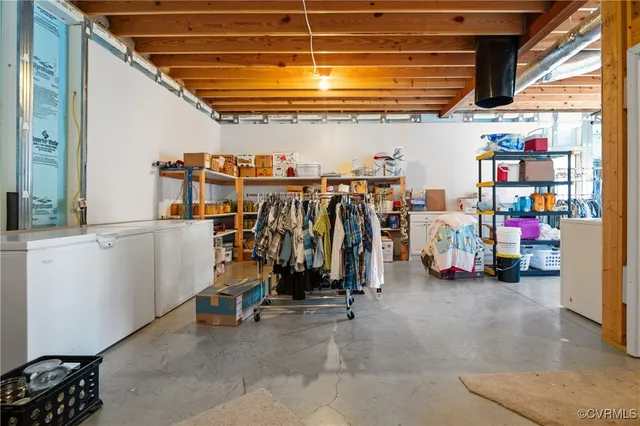 a bathroom with a granite countertop shower a toilet and a sink