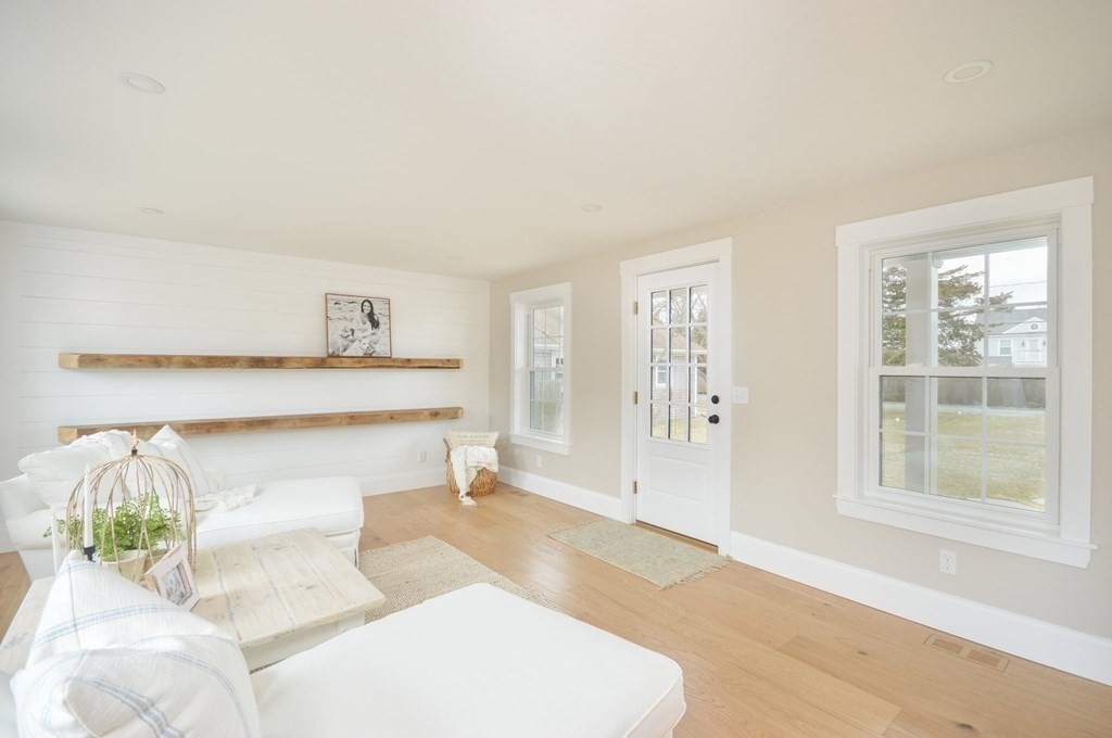 52 Uncle Barneys Road Dennis, MA 02670 - Photo 14 of 42 a living room with furniture and a window
