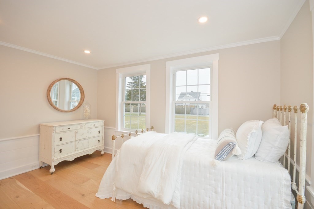 52 Uncle Barneys Road Dennis, MA 02670 - Photo 16 of 42 a bedroom with a bed and a dresser
