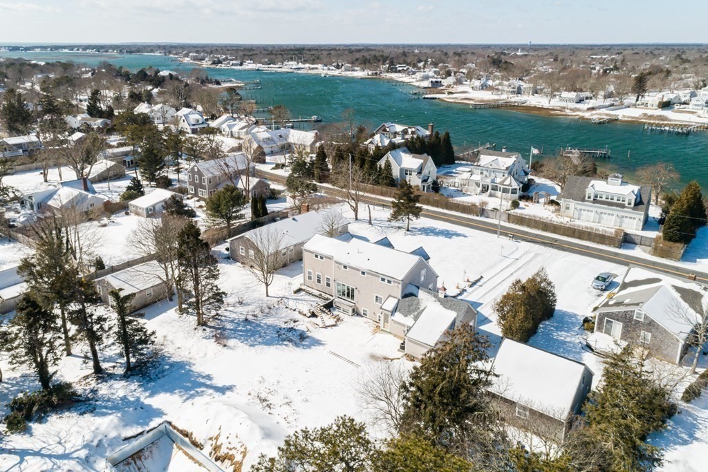 52 Uncle Barneys Road Dennis, MA 02670 - Photo 39 of 42 a view of a terrace with lawn chairs