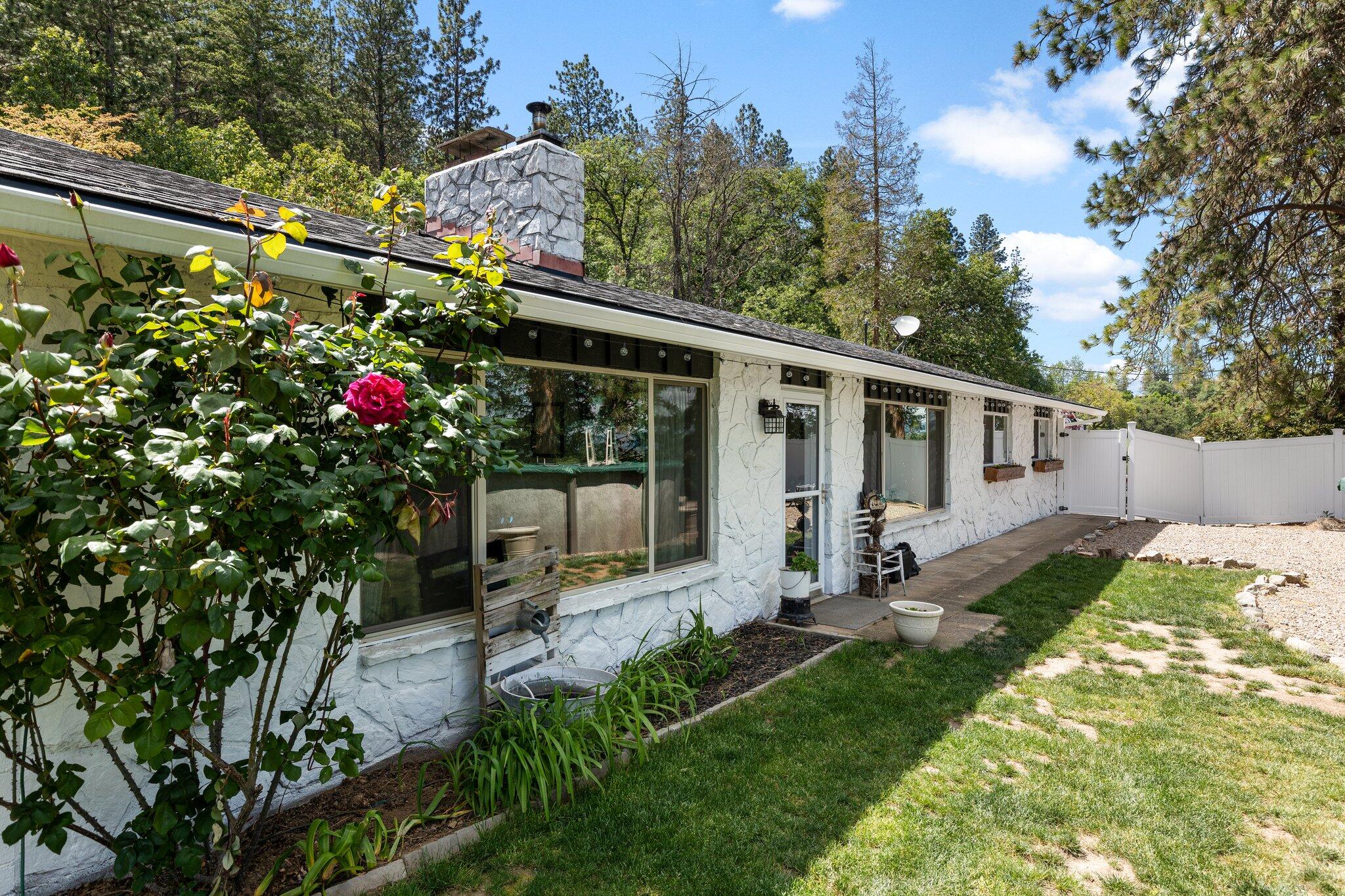 3765 Old Stage Road Central Point, OR 97502 - Photo 2 of 38 a view of a house with backyard and sitting area