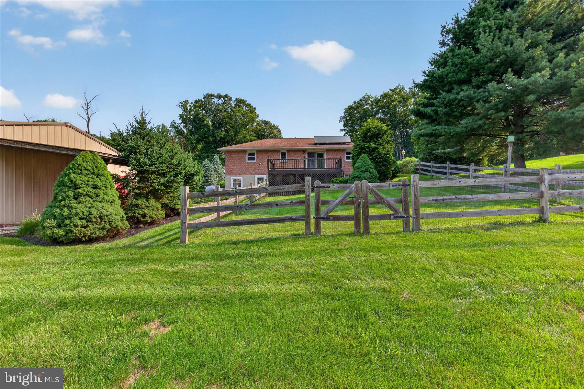 239 Lawn Road Palmyra, PA 17078 - Photo 31 of 64 Charming home with lush green surroundings.