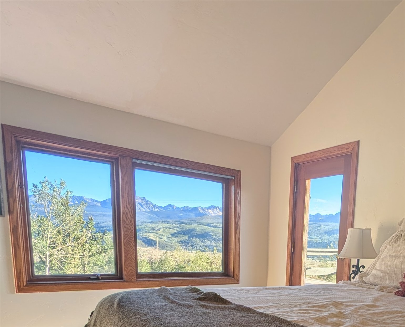 1703 Elk Run Road Silverthorne, CO 80498 - Photo 26 of 50 a view of bedroom with wooden floor and window