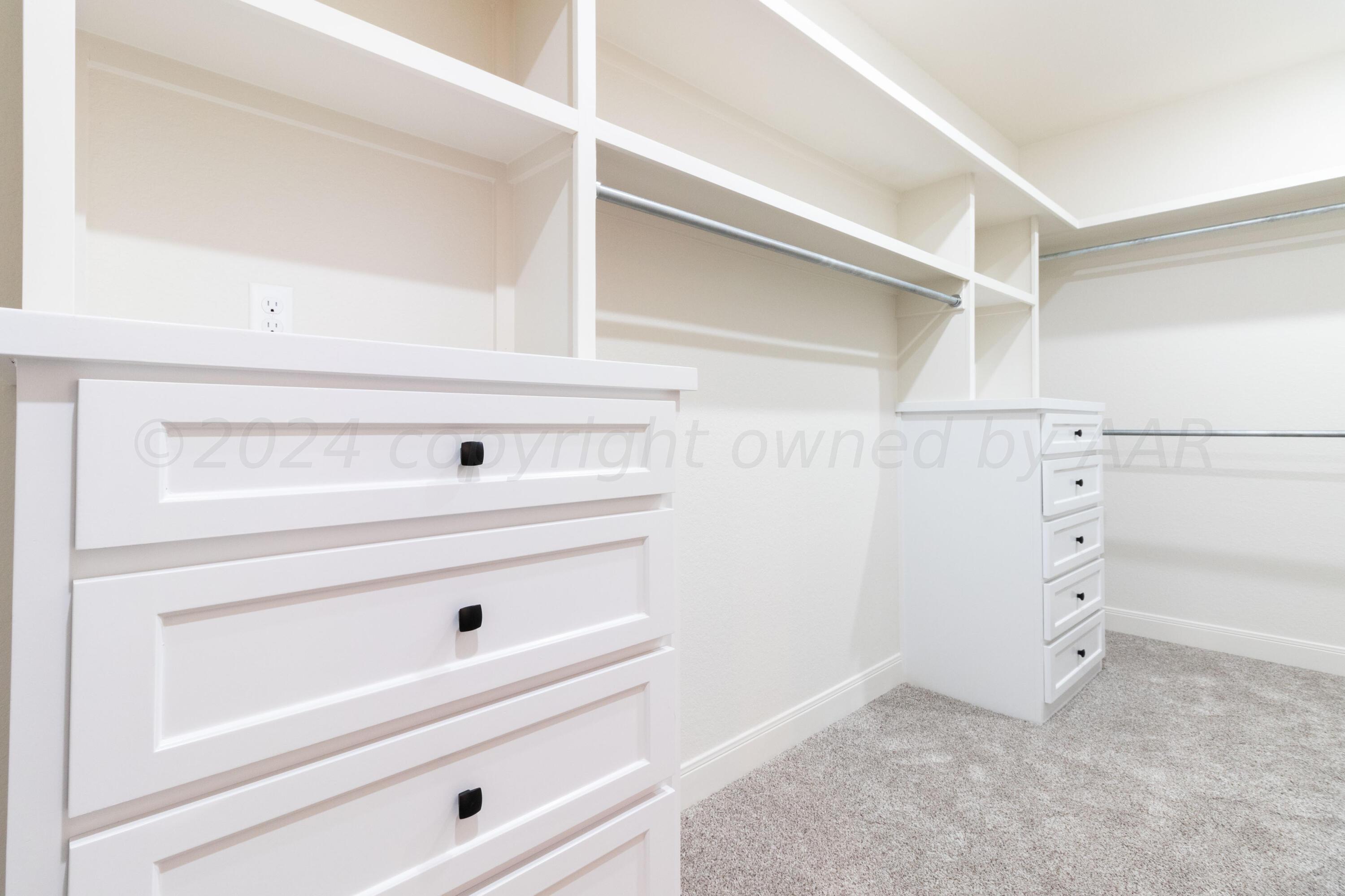 9301 Clinton Glenn Road Amarillo, TX 79119 - Photo 25 of 47 Primary wrap closet