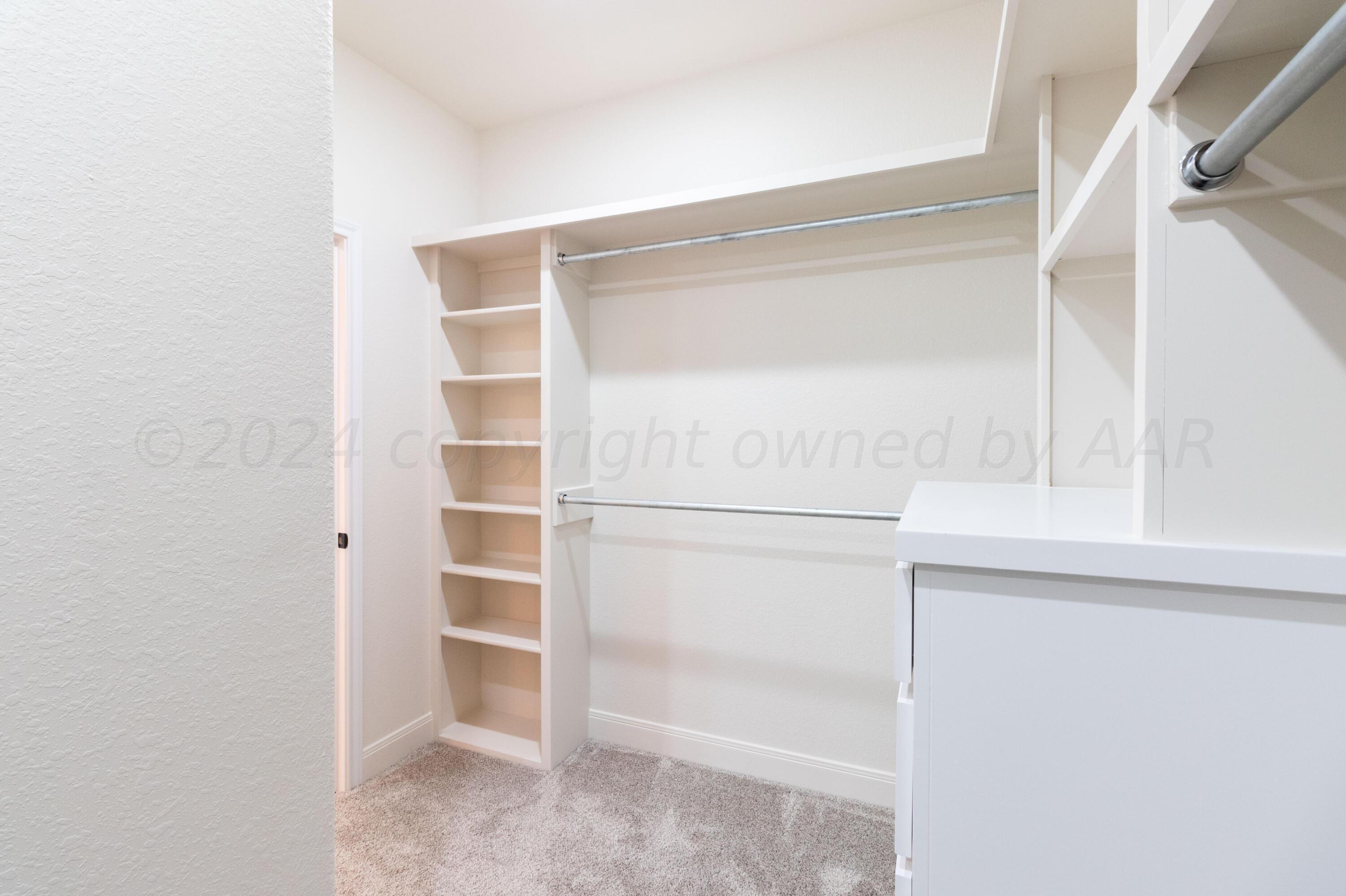 9301 Clinton Glenn Road Amarillo, TX 79119 - Photo 27 of 47 Primary Wrap Closet