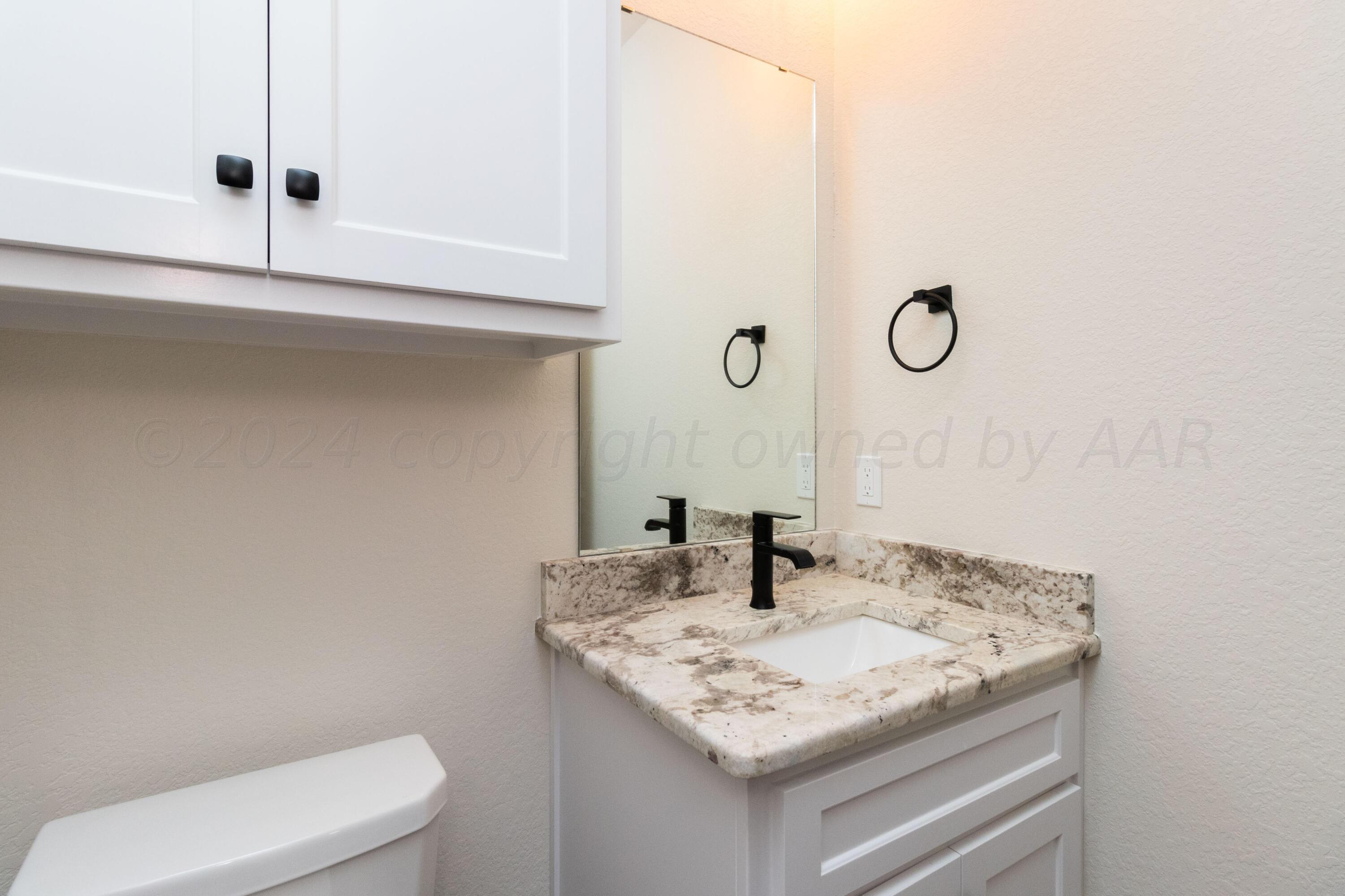 9301 Clinton Glenn Road Amarillo, TX 79119 - Photo 38 of 47 Powder Bath