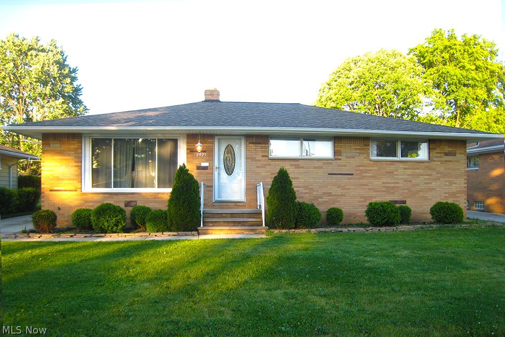 Brick front with new roof in 2006. Simple landscaping. Single floor living.