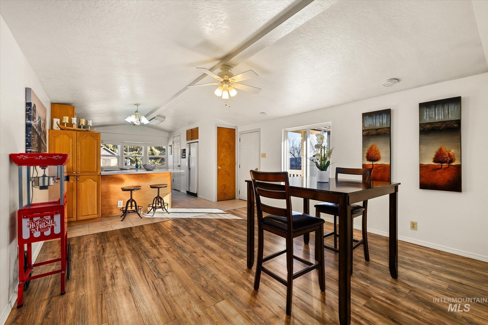 9820 Highway 44 Middleton, ID 83644 - Photo 17 of 50 Dining area featuring light wood-type flooring and a ceiling fan