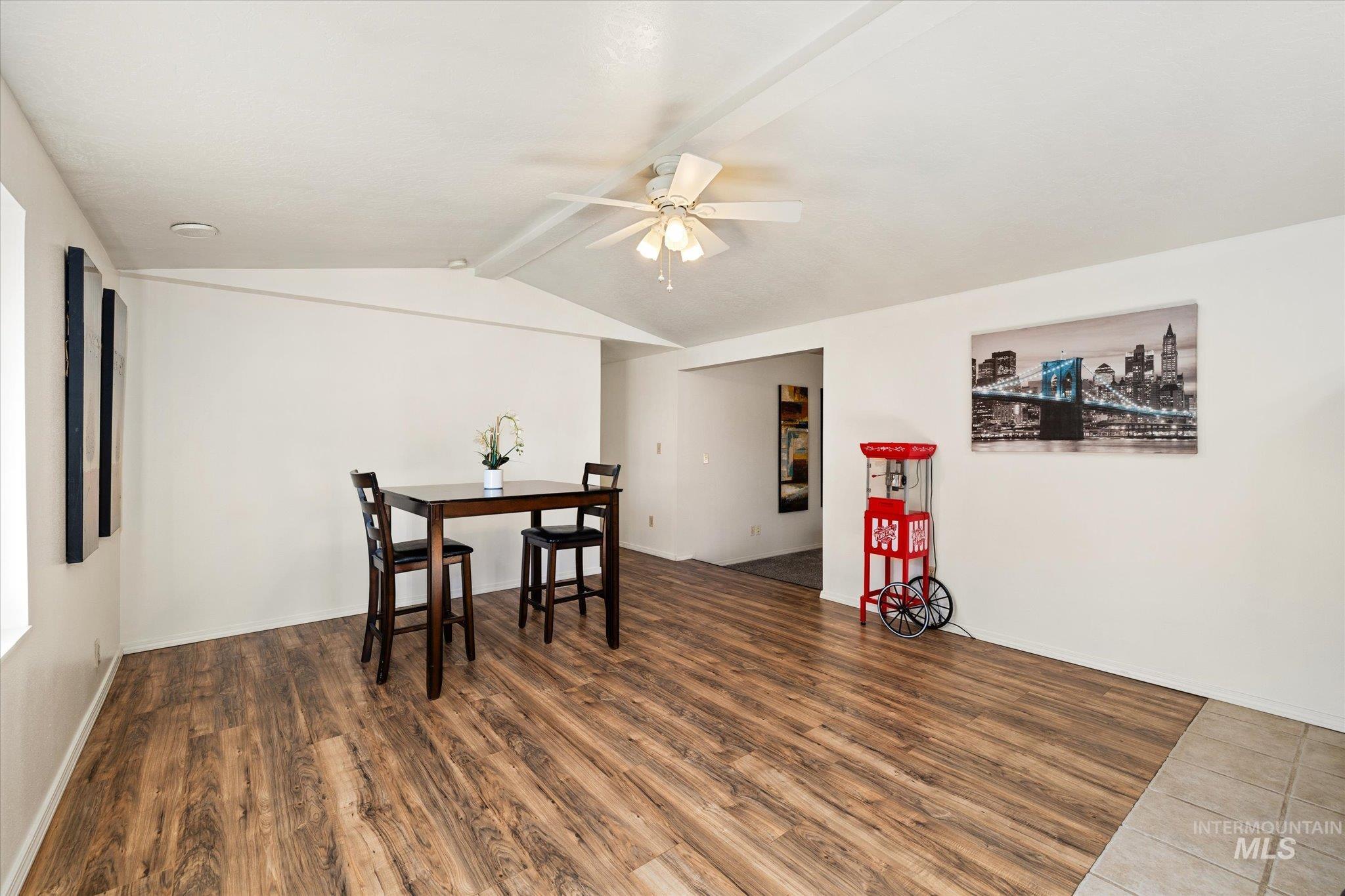 9820 Highway 44 Middleton, ID 83644 - Photo 19 of 50 Dining area with ceiling fan, wood finished floors, and beamed ceiling