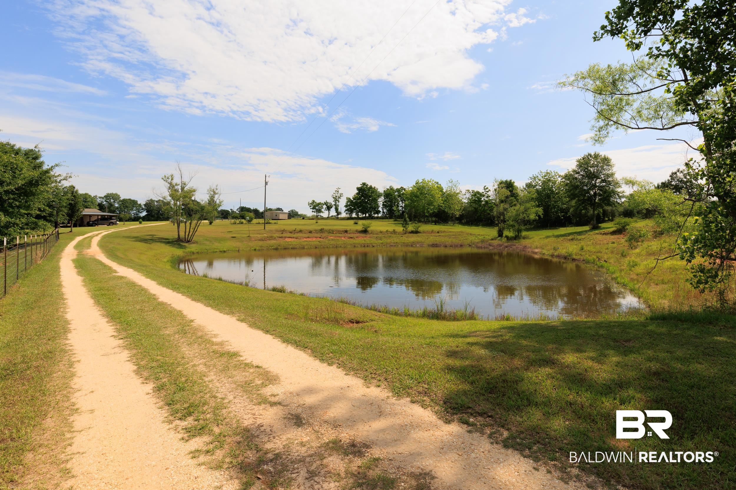 6725 Upper Creek Road Flomaton, AL 36441 - Photo 22 of 61 Water view featuring fence