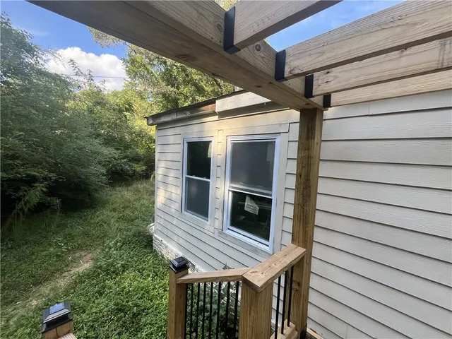 a bathroom with a sink vanity and toilet