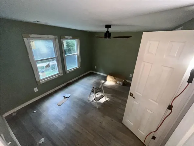 a bathroom with a tub sink a mirror and shower