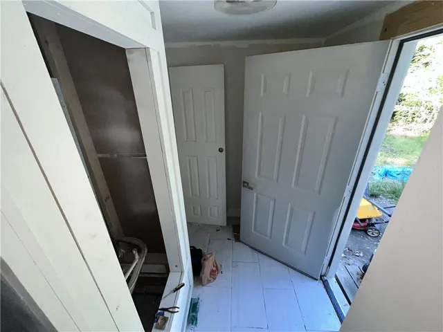 a bathroom with a sink and mirror