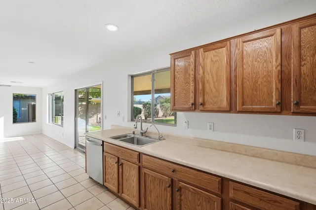 a bathroom with a sink and a large mirror