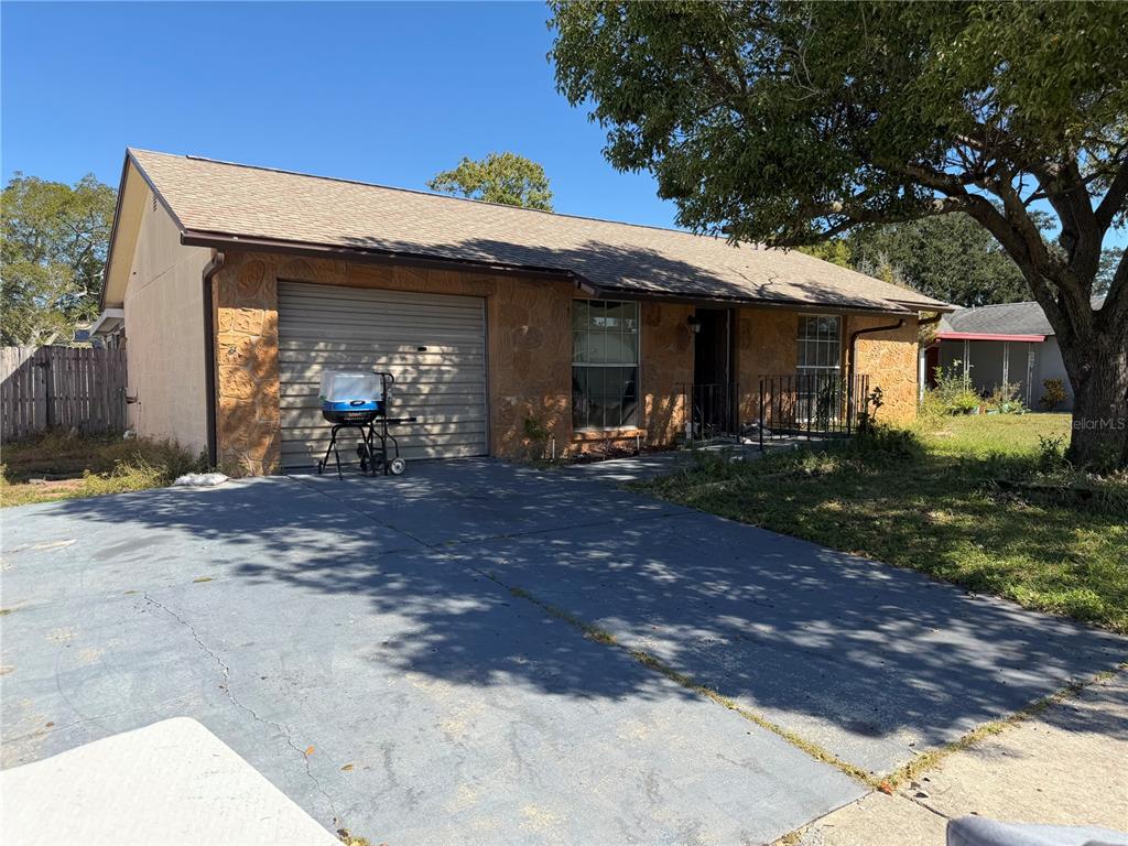 7645 Arlight Drive New Port Richey, FL 34655 - Photo 1 of 1 a view of a house with outdoor space
