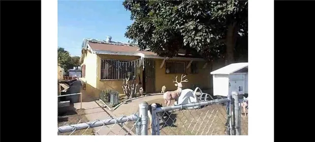 a view of living room filled with furniture and a patio