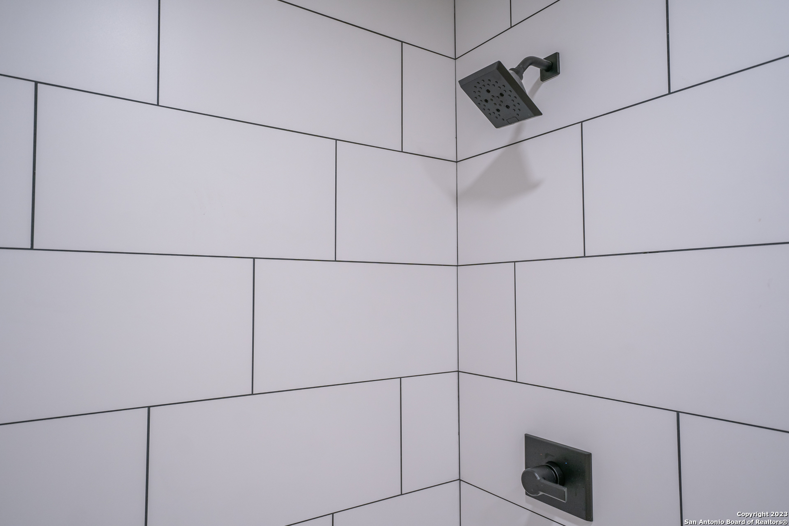 1225 Texas Oaks, Unit D Spring Branch, TX 78070 - Photo 12 of 20 a view of a refrigerator and window in a kitchen