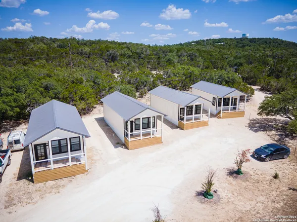 an aerial view of a house with a outdoor space