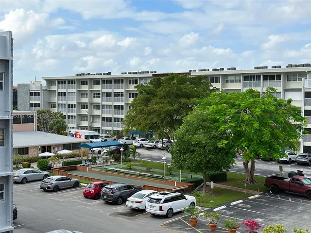 a view of hallway with furniture