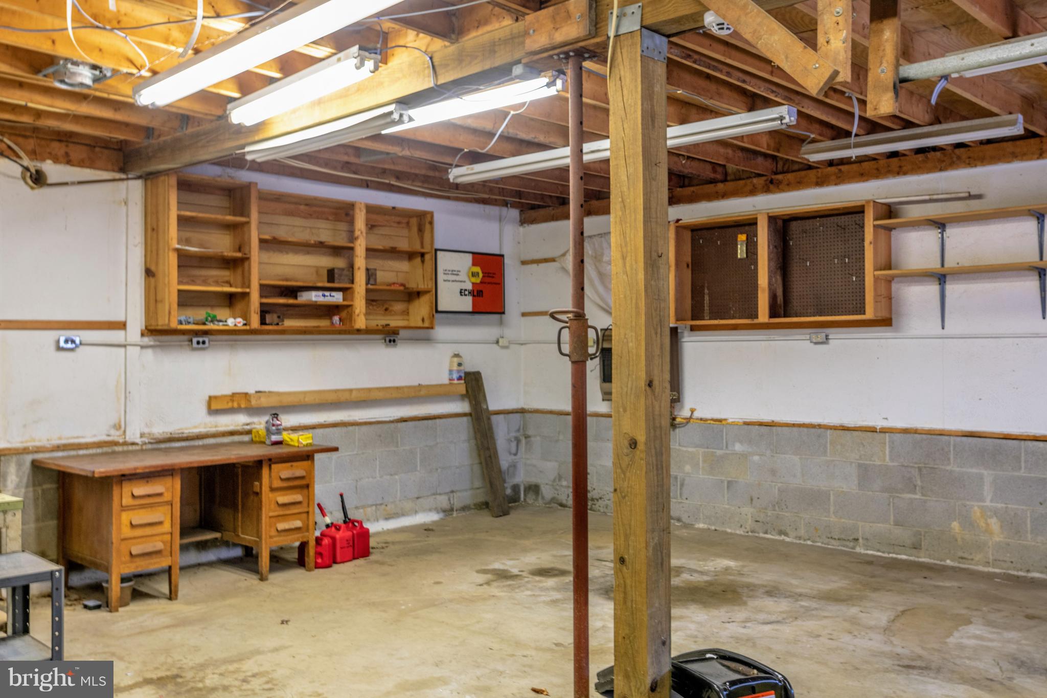 12820 Rousby Hall Road Lusby, MD 20657 - Photo 25 of 39 a storage utility room