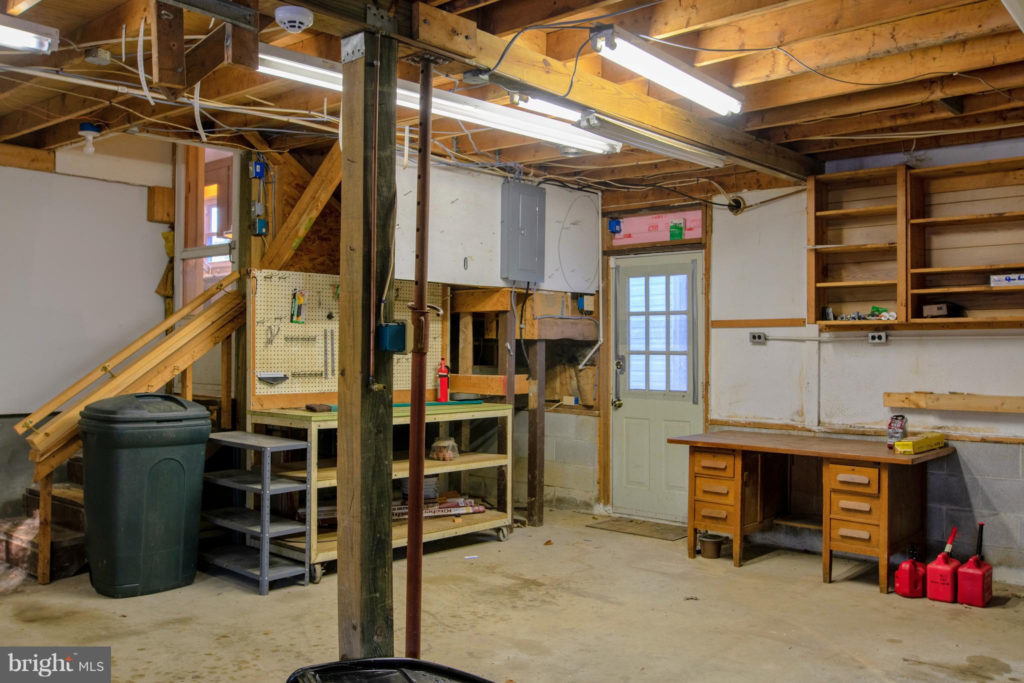 12820 Rousby Hall Road Lusby, MD 20657 - Photo 26 of 39 a view of storage and utility room
