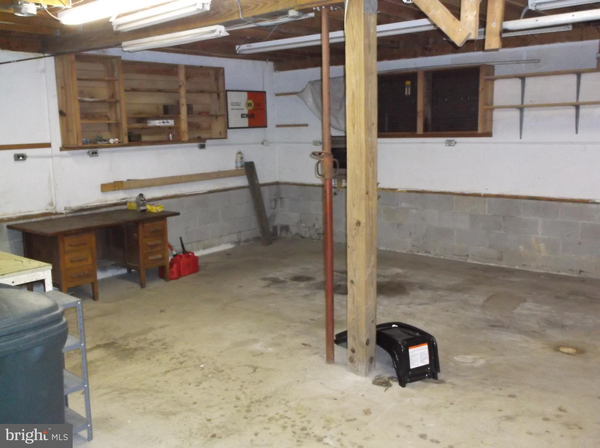 12820 Rousby Hall Road Lusby, MD 20657 - Photo 27 of 39 a view of storage and utility room